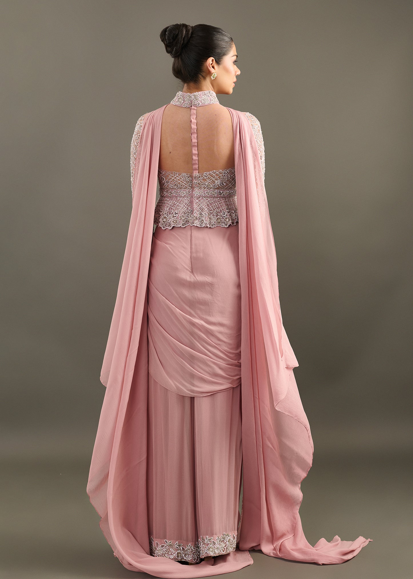 Fusion Mauve Ensemble with Peplum Bodice and Flowing Pallu