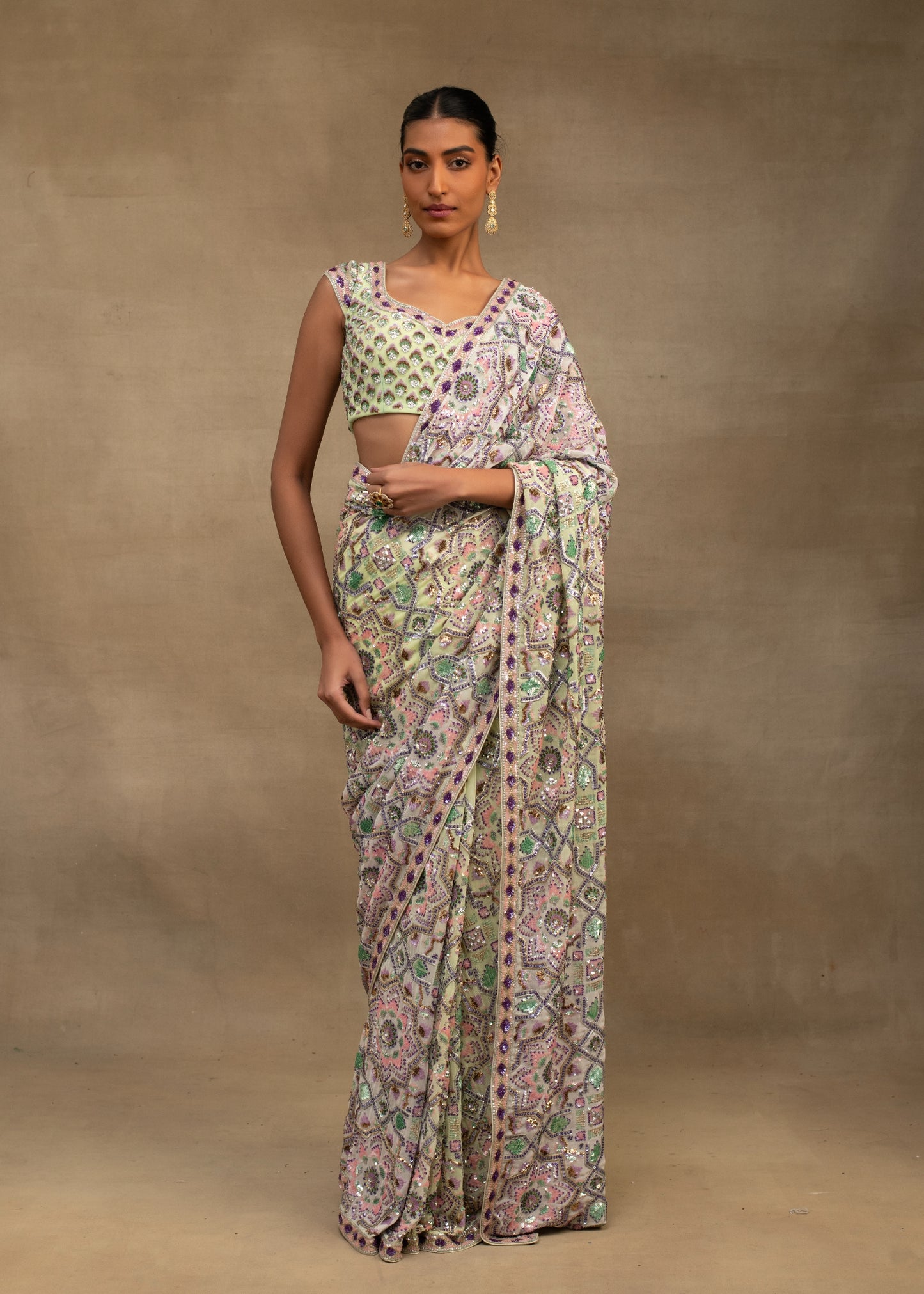 Pastel Toned Saree with blouse.