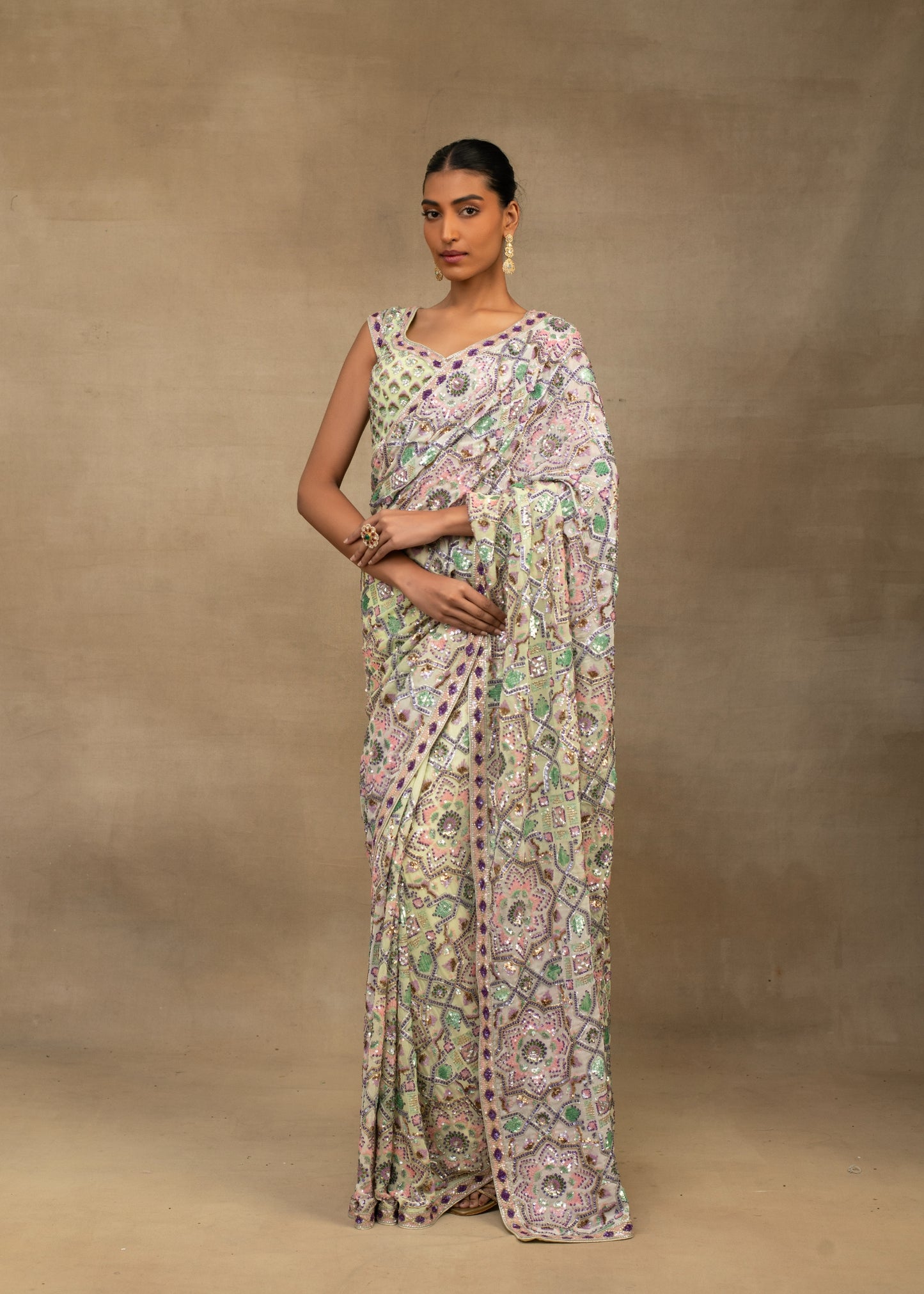 Pastel Toned Saree with blouse.