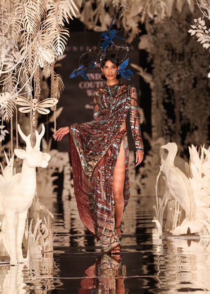 Abstract Printed Cape Gown with High Slit and Feathered Headpiece