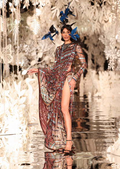 Abstract Printed Cape Gown with High Slit and Feathered Headpiece