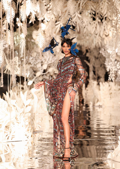 Abstract Printed Cape Gown with High Slit and Feathered Headpiece