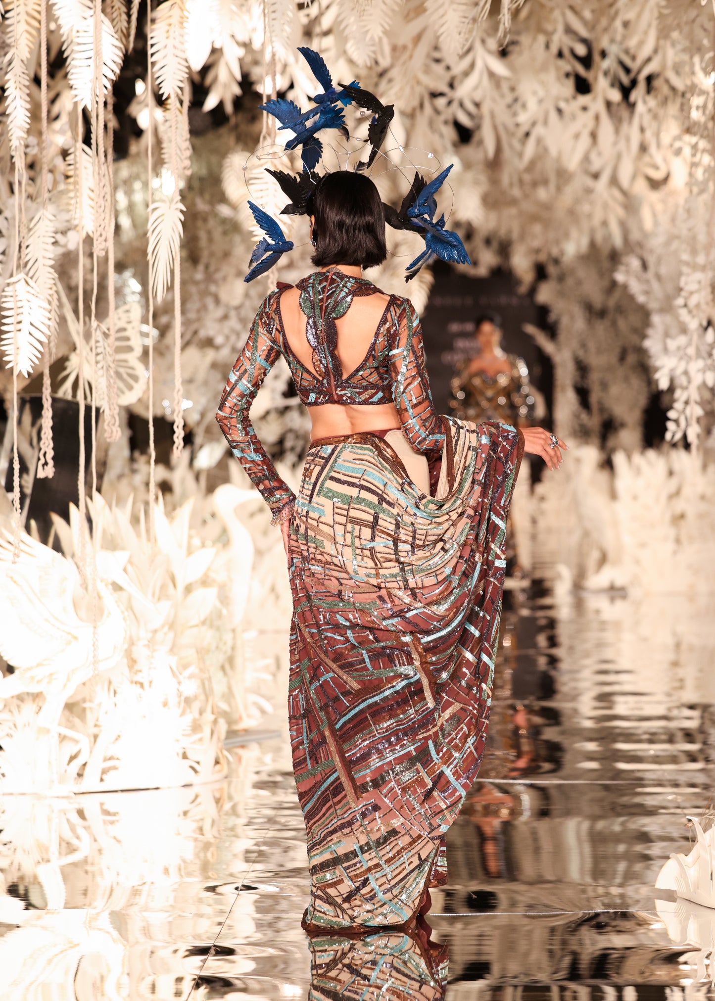 Abstract Printed Cape Gown with High Slit and Feathered Headpiece