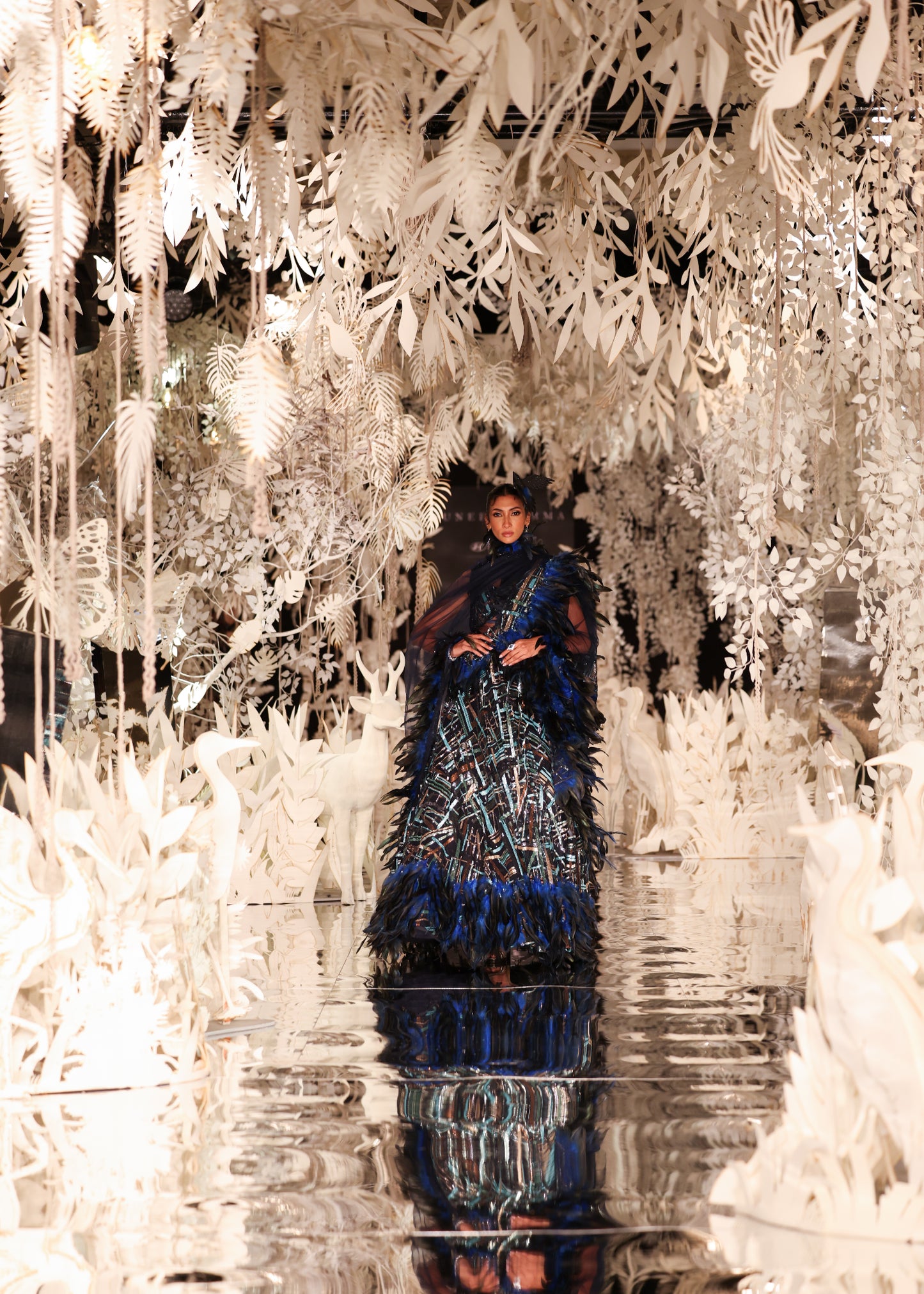 Feathered Lehenga with Beaded Bustier and Cape