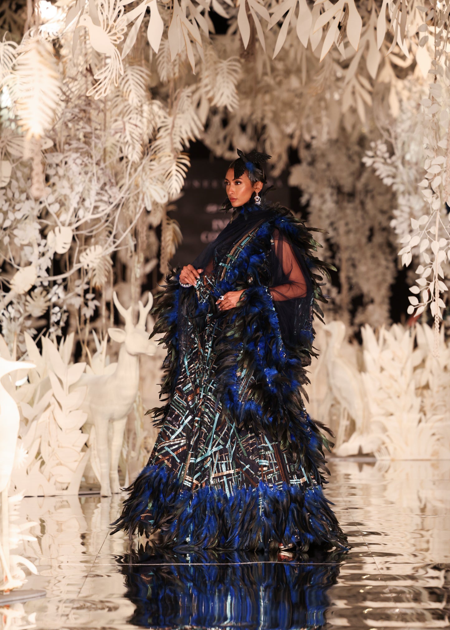 Feathered Lehenga with Beaded Bustier and Cape