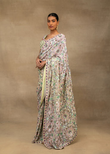Pastel Toned Saree with blouse.